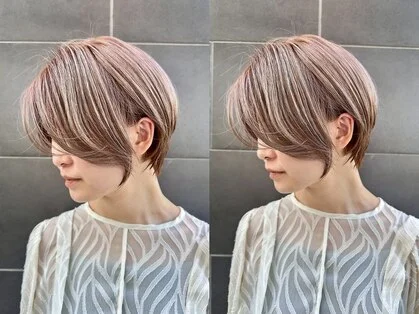 毛先までなめらかに整えた女性のストレートヘアの後ろ姿